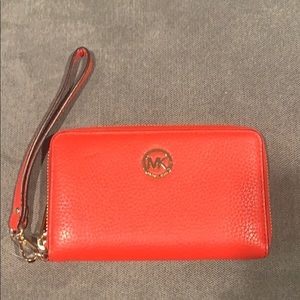 Tangerine Michael Kors wristlet